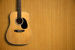 © christianchan - Acoustic guitar on wooden background