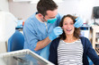 © Production Perig - Young attractive woman being cured by a dentist