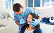© Production Perig - Young attractive woman being cured by a dentist