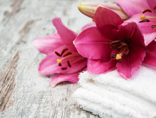 Wall Mural - Pink lily and  towels