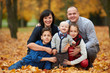 © Aliaksei Lasevich - happy family in autumn park