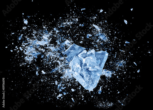Fotografie, Obraz Abstract blue Ice crash explosion parts on black background