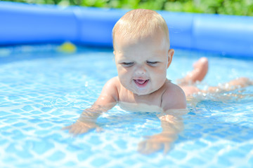 little baby in the water pool