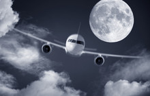 Airplane And A Full Moon