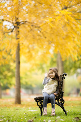 Canvas Print - Little girl at the bench