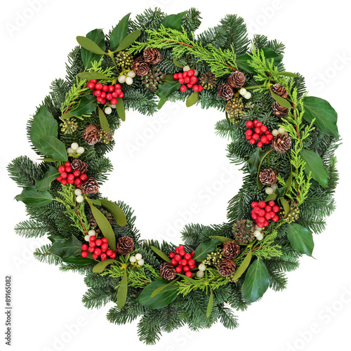 Traditional Christmas Wreath with holly, ivy, mistletoe and winter