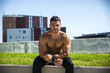 Handsome Muscular Shirtless Hunk Man Outdoor in City
