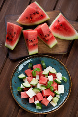 Poster - Salad with watermelon, cucumber and cheese, above view