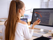© shefkate - Young woman working in office, sitting at desk