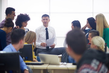 Wall Mural - students with teacher  in computer lab classrom