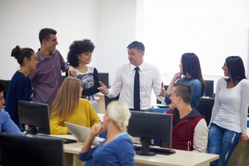 Canvas Print - students with teacher  in computer lab classrom