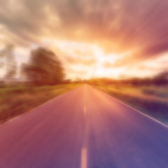 Wall Mural - adstract blurred country road and field with beautiful sunset vi