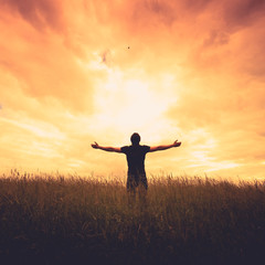 Wall Mural - silhouette of man and sunshine