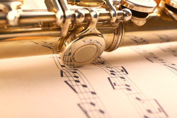 Wall Mural - Silver flute on music notes background