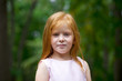 © Andrey_Arkusha - Close up, portrait of little redheaded girl