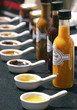 Set of delicious home-made chilli sauces in row
