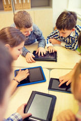 Sticker - group of school kids with tablet pc in classroom