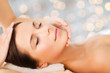 © Syda Productions - beautiful woman in spa salon having facial massage
