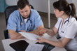 Doctors confer about diagnosis in the hospital