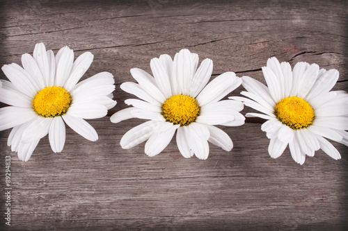 Fototapeta do kuchni flowers on a wooden table