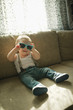 © Aliaksei Lasevich - cute little boy in sunglasses