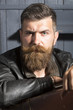 © Volodymyr - Portrait of serious man with briefcase