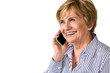 © progat - Beautiful mature woman speaking on the phone on a white backgrou