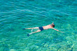 © t0m15 - A man snorkeling in the crystal clear sea or ocean
