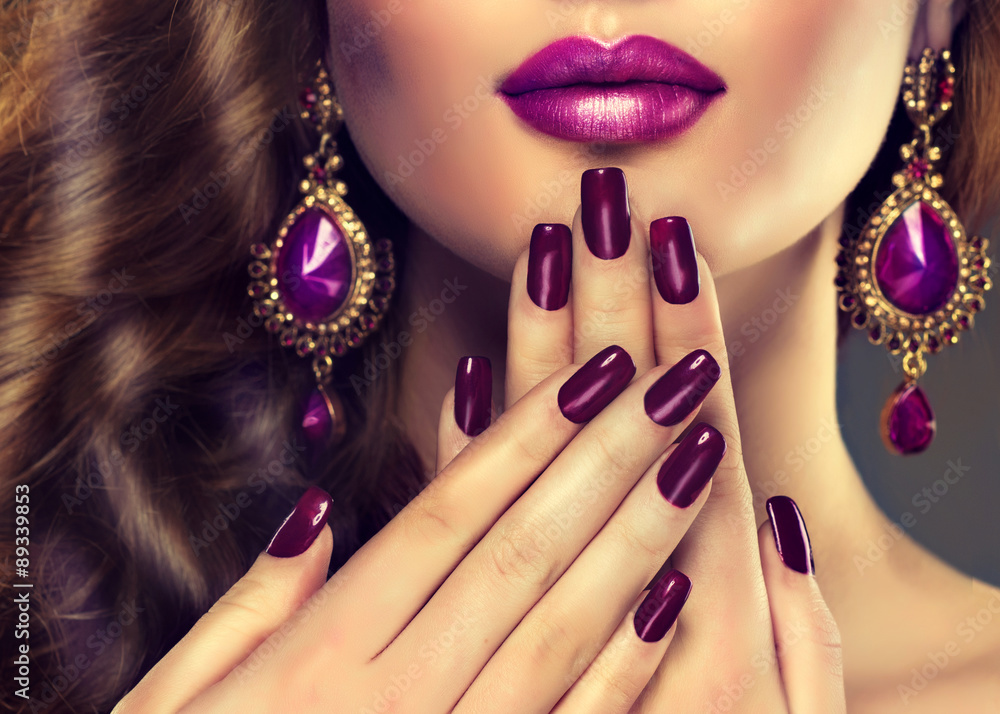 Luxury fashion style, manicure nail , cosmetics and make-up .  Jewelry , large purple earrings - obrazy, fototapety, plakaty 