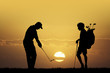 Golf tournament at sunset