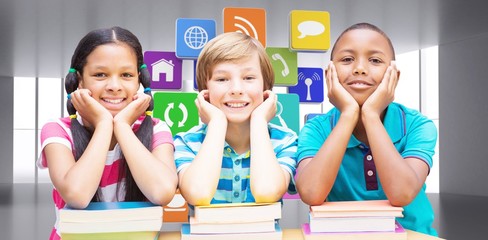 Sticker - Composite image of cute pupils looking at camera in library 