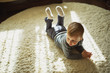 © Aliaksei Lasevich - little boy lying on the carpet