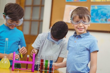 Wall Mural - Pupils at science lesson in classroom