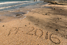 New Year's greeting in sand