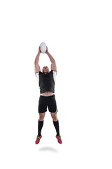 Wall Mural - Rugby player catching the ball