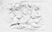 Black And White Photography Of Basrelief With Cherubs
