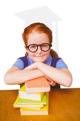 Wall Mural - Composite image of cute pupil at desk