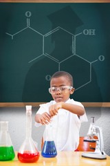 Canvas Print - Composite image of cute pupil playing scientist