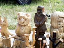Wooden Carvings Of Mythical Figures. Creativity Of The People Of Russia. Traditional Folk Souvenirs.
