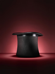 magic top hat on red - stock image