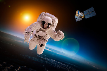 Wall Mural - astronaut in outer space