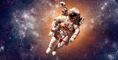 Wall Mural - astronaut in outer space