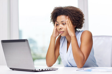 Wall Mural - african woman with laptop at office