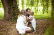 © Westend61 - Family in a park