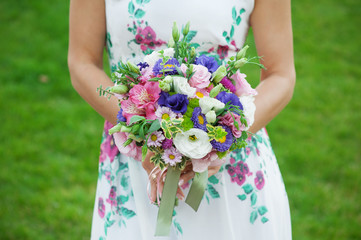 Wall Mural - Bride holding beautiful wedding bouquet