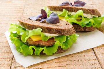 Two sandwiches with smoked salmon