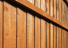 Wooden Garden Fence Close Up With Vertical Panels And Horizontal