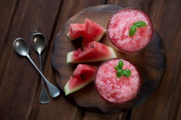 Wall Mural - Top view of delicious watermelon granitas, rustic wooden surface