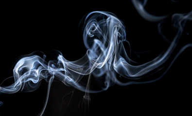 Sticker - Abstract smoke on a black background.