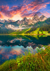 Wall Mural - colorful summer sunrise on the vorderer gosausee lake